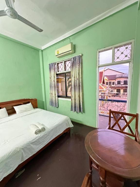 Kfg Guesthouse Thakhek Quarto foto